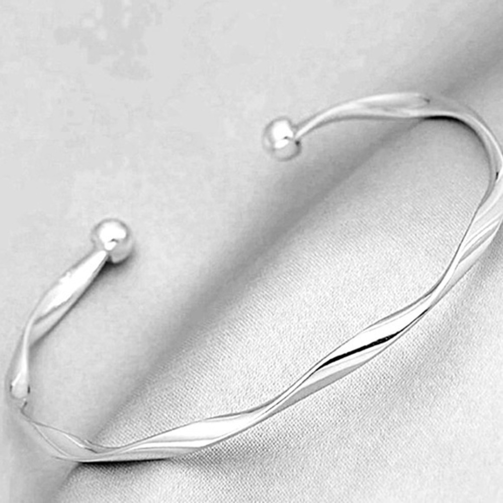 Anthropologie Minimalist twisted silver Bangle Cuff Bracelet